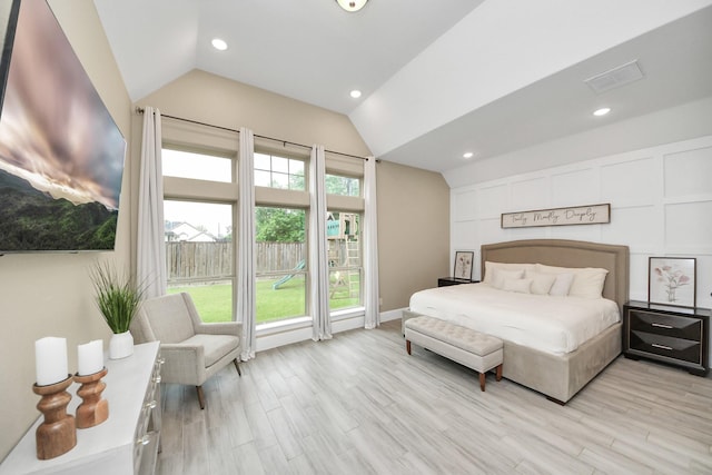 203 Pinedale Ave, Arcola, TX 77583 - bedroom featuring vaulted ceiling, light wood-style flooring, and recessed lighting