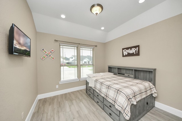 203 Pinedale Ave, Arcola, TX 77583 - bedroom featuring vaulted ceiling, light wood-style floors, and recessed lighting