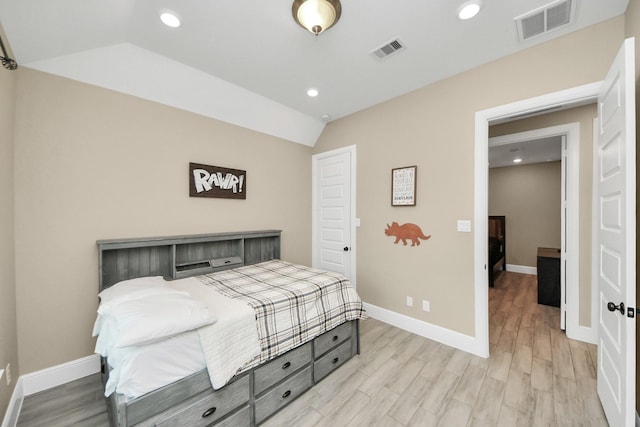 203 Pinedale Ave, Arcola, TX 77583 - bedroom featuring lofted ceiling, light wood finished floors, and recessed lighting