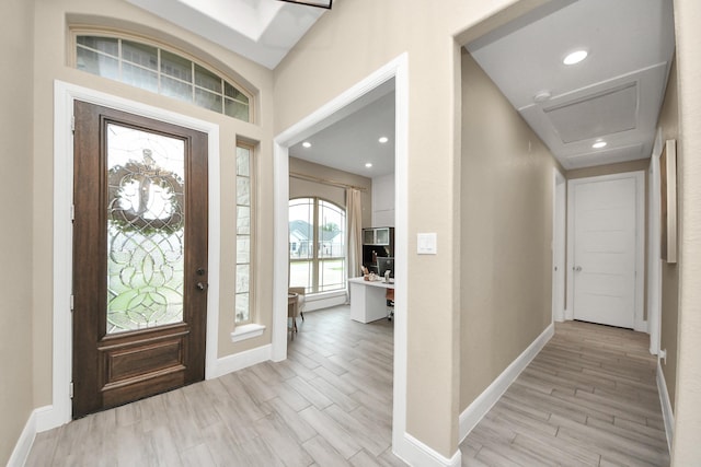 203 Pinedale Ave, Arcola, TX 77583 - foyer entrance featuring light wood finished floors and recessed lighting