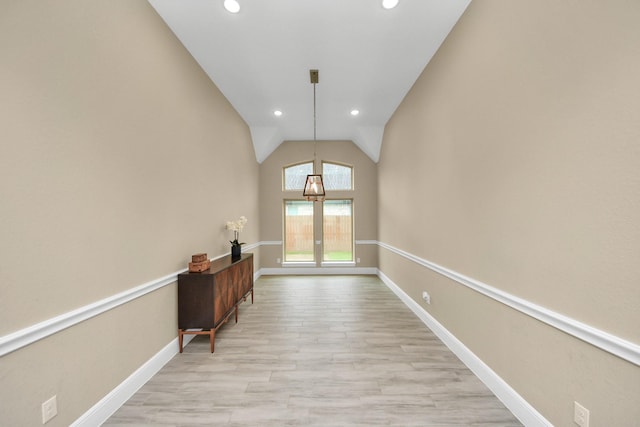 203 Pinedale Ave, Arcola, TX 77583 - hallway with a chandelier, recessed lighting, light wood-style flooring, and vaulted ceiling