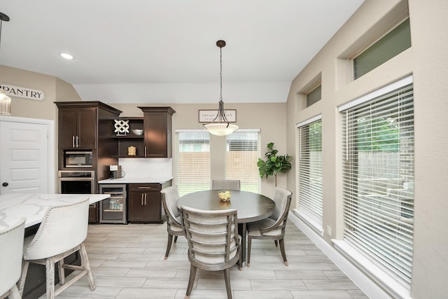 203 Pinedale Ave, Arcola, TX 77583 - dining space featuring wine cooler, recessed lighting, and light wood-style floors