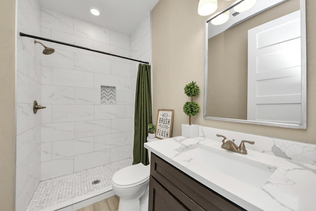 203 Pinedale Ave, Arcola, TX 77583 - bathroom featuring vanity and tiled shower