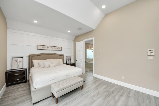 203 Pinedale Ave, Arcola, TX 77583 - bedroom with light wood-style flooring, vaulted ceiling, and recessed lighting