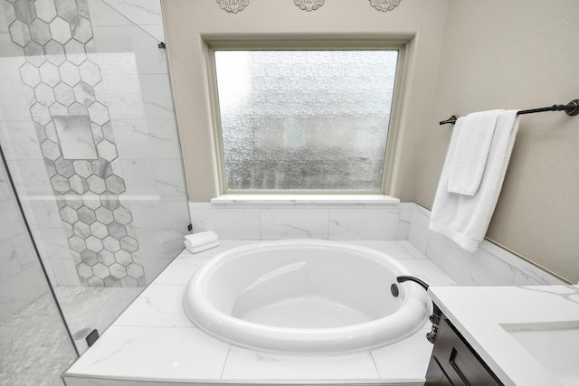 203 Pinedale Ave, Arcola, TX 77583 - bathroom featuring plenty of natural light, a bath, vanity, and a tile shower