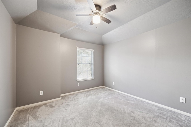 6111 Branch Lake Dr, Houston, TX 77066 - carpeted spare room featuring ceiling fan, lofted ceiling, and a textured ceiling