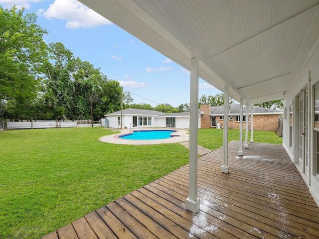 5010 Riverview Dr, Alvin, TX 77511 - wooden deck with a fenced backyard and an outdoor pool
