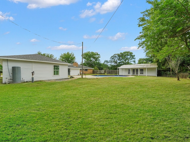 5010 Riverview Dr, Alvin, TX 77511 - fenced backyard featuring french doors and a patio