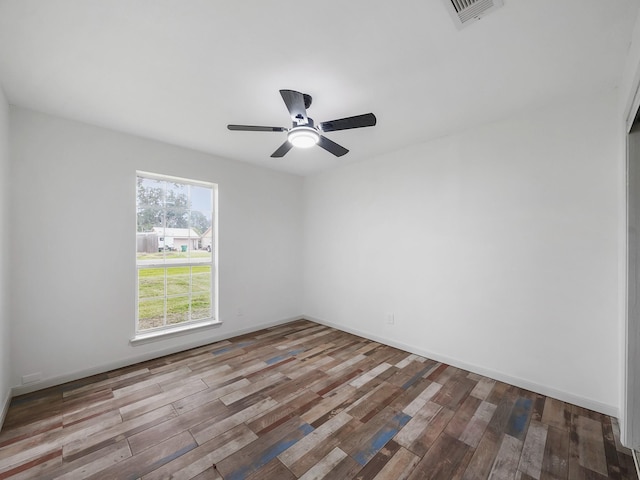 5010 Riverview Dr, Alvin, TX 77511 - unfurnished room featuring wood finished floors and a ceiling fan