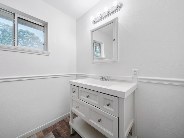 5010 Riverview Dr, Alvin, TX 77511 - bathroom with vanity and wood finished floors