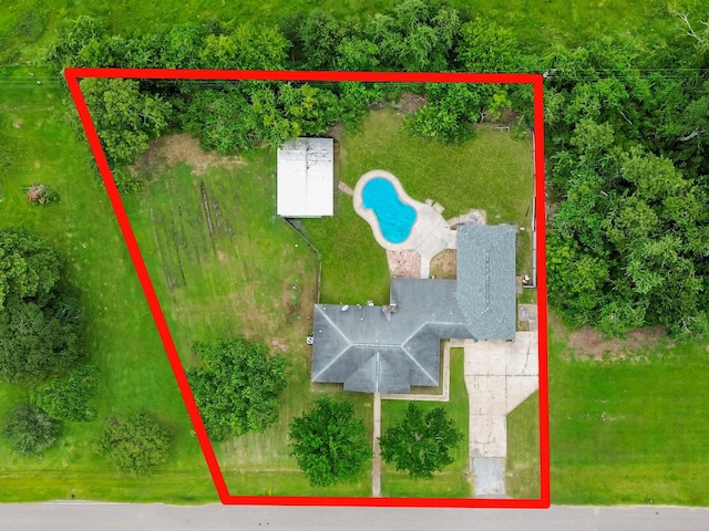 5010 Riverview Dr, Alvin, TX 77511 - aerial view of property and surrounding area featuring property boundaries highlighted and a pool