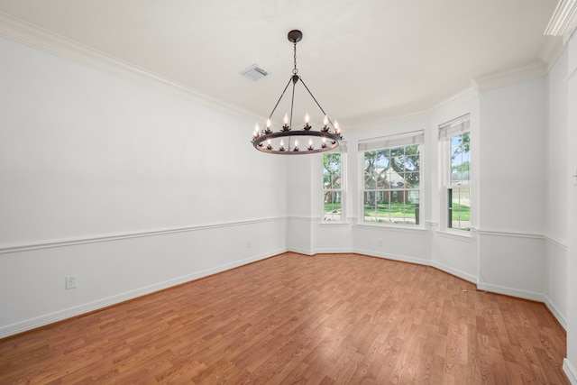 1922 Stormcroft Cir, Katy, TX 77450 - empty room featuring a chandelier, wood finished floors, and crown molding