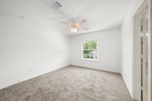 1922 Stormcroft Cir, Katy, TX 77450 - empty room featuring carpet flooring, ceiling fan, and a smoke detector