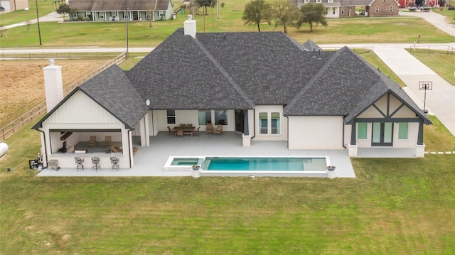 14923 Old Irish Farm Rd, Baytown, TX 77523 - back of house featuring a chimney, outdoor lounge area, and a shingled roof