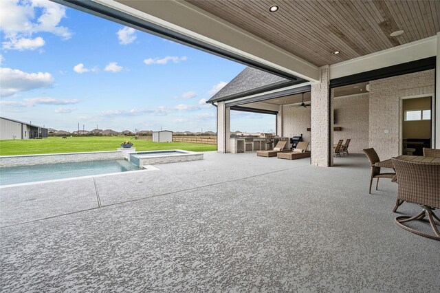 14923 Old Irish Farm Rd, Baytown, TX 77523 - view of patio featuring a storage unit, an outdoor hangout area, a ceiling fan, and a pool with connected hot tub