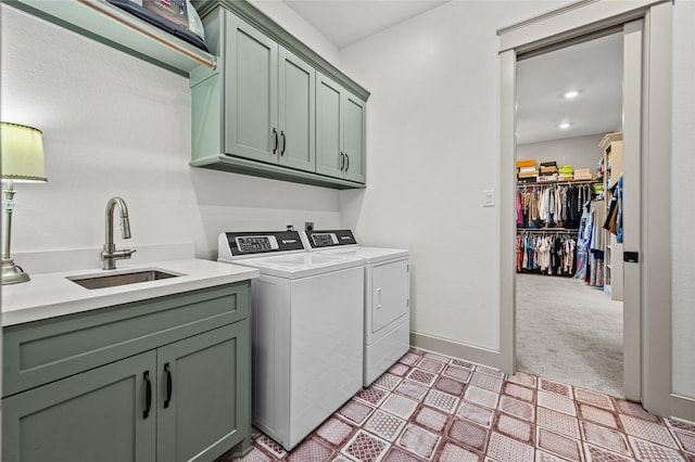 14923 Old Irish Farm Rd, Baytown, TX 77523 - laundry room featuring washing machine and dryer, cabinet space, and light carpet