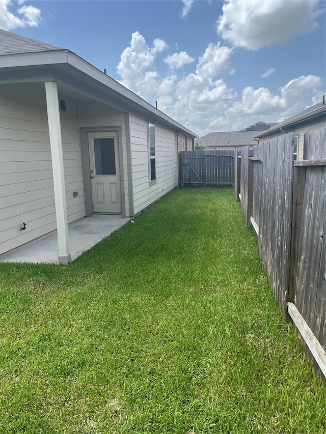 2135 Republic Way, Missouri City, TX 77489 - fenced backyard with a patio
