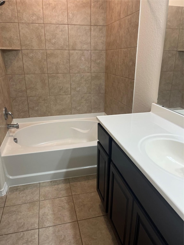 2135 Republic Way, Missouri City, TX 77489 - full bath with vanity,  shower combination, a textured wall, and tile patterned flooring
