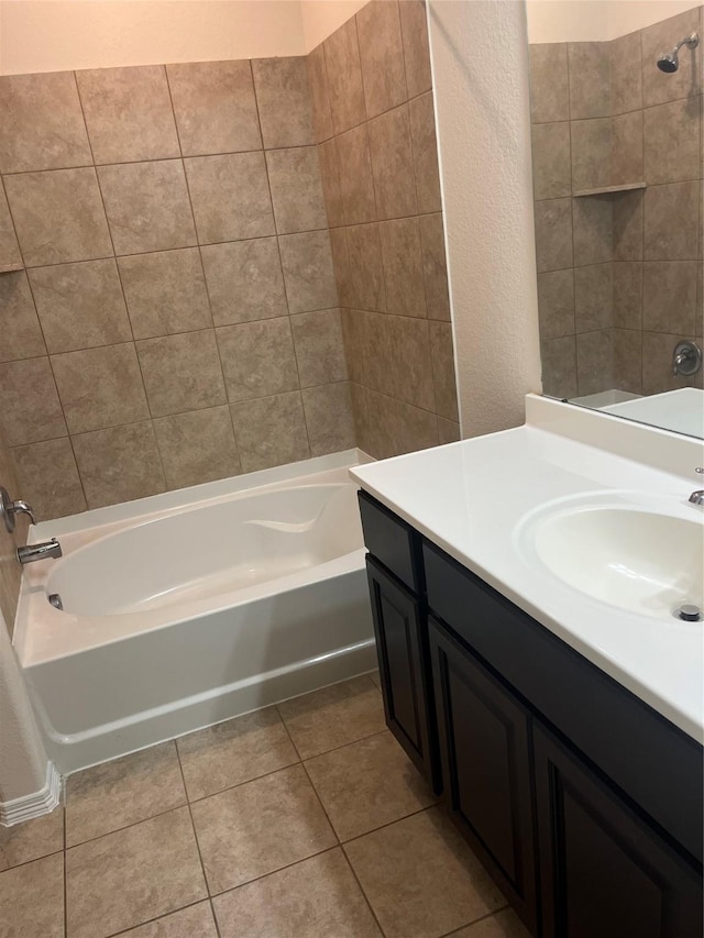 2135 Republic Way, Missouri City, TX 77489 - full bathroom featuring shower / bathtub combination, vanity, tile patterned floors, and a textured wall