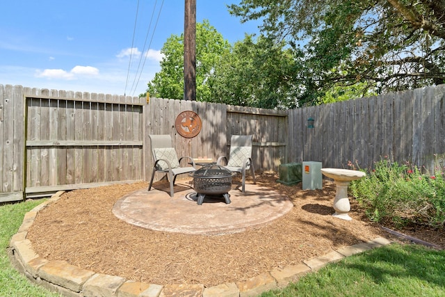 3426 Satton Ranch Ln, Fulshear, TX 77441 - fenced backyard featuring a fire pit