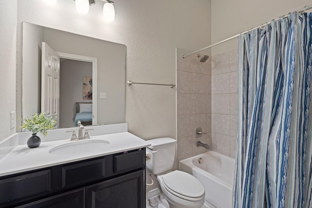 3426 Satton Ranch Ln, Fulshear, TX 77441 - full bath featuring a textured wall, vanity, and shower / bath combo