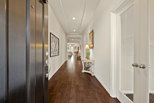 3426 Satton Ranch Ln, Fulshear, TX 77441 - corridor featuring arched walkways, dark wood-style flooring, and recessed lighting