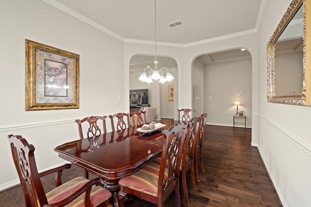 3426 Satton Ranch Ln, Fulshear, TX 77441 - dining space featuring arched walkways, a chandelier, ornamental molding, and wood finished floors
