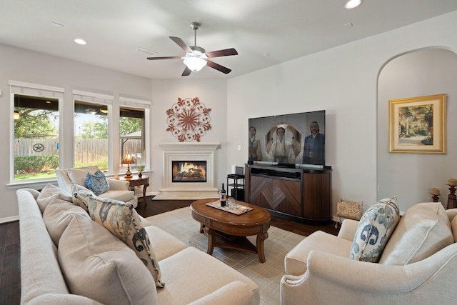 3426 Satton Ranch Ln, Fulshear, TX 77441 - living area with wood finished floors, recessed lighting, a ceiling fan, and a glass covered fireplace