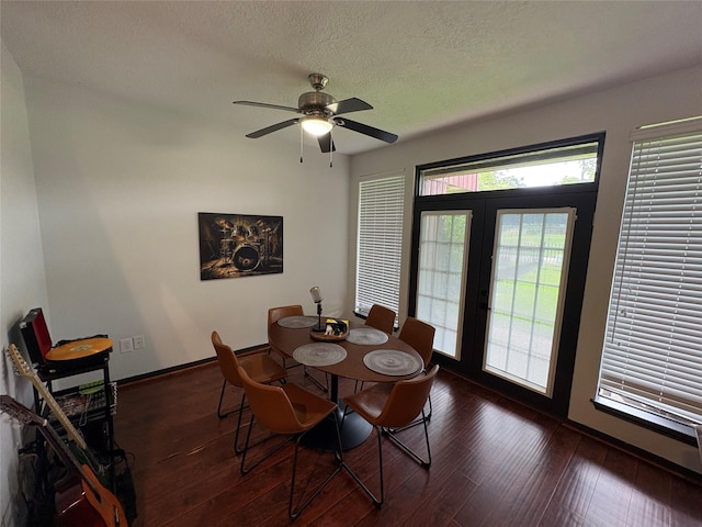 3244 Poe Dr, Montgomery, TX 77356 - dining room with hardwood / wood-style floors, a textured ceiling, and a ceiling fan