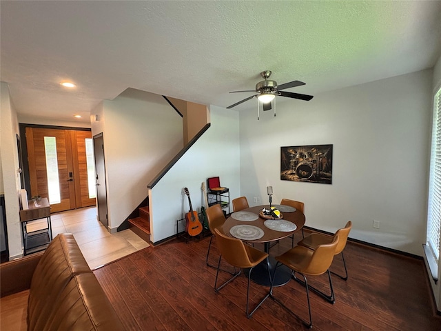 3244 Poe Dr, Montgomery, TX 77356 - dining room featuring stairway, light wood-style floors, a ceiling fan, and recessed lighting