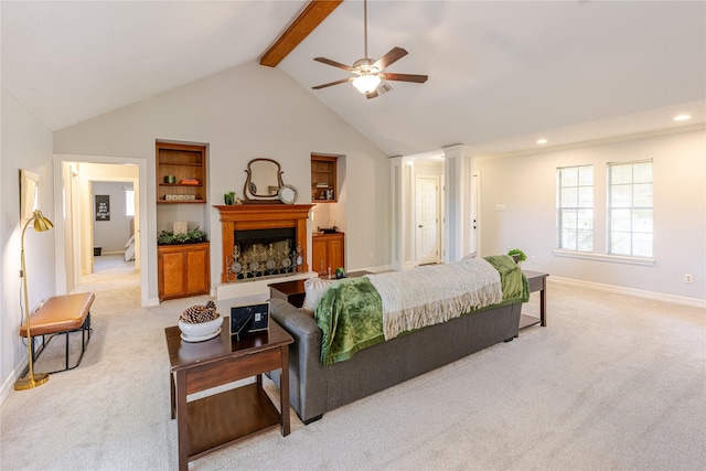 214 Balsam St, Lake Jackson, TX 77566 - bedroom with light colored carpet, ornate columns, a fireplace with raised hearth, recessed lighting, and ceiling fan