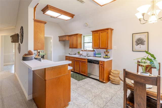214 Balsam St, Lake Jackson, TX 77566 - kitchen with dishwasher, vaulted ceiling, a chandelier, light countertops, and brown cabinets