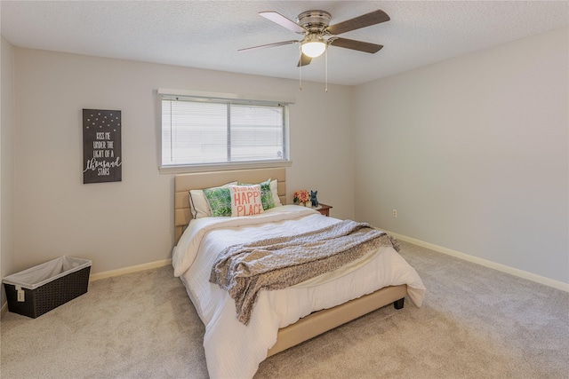 214 Balsam St, Lake Jackson, TX 77566 - carpeted bedroom featuring ceiling fan and a textured ceiling