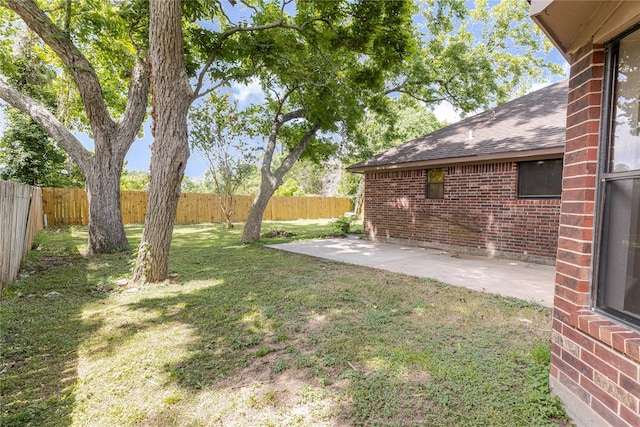 214 Balsam St, Lake Jackson, TX 77566 - fenced backyard with a patio area