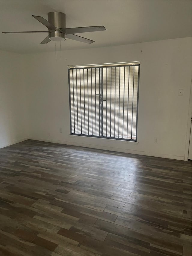 5625 Antoine Dr Unit 1011, Houston, TX 77091 - empty room featuring dark wood finished floors and a ceiling fan