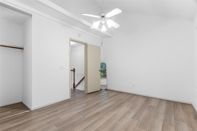 2930 Grants Lake Blvd Unit 2404, Sugar Land, TX 77479 - unfurnished bedroom featuring wood finished floors, vaulted ceiling, ceiling fan, and a closet