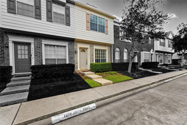 2930 Grants Lake Blvd Unit 2404, Sugar Land, TX 77479 - colonial home featuring entry steps and brick siding