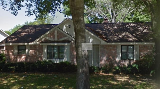 8711 S Dairy Ashford Rd, Houston, TX 77099 - view of front facade with brick siding