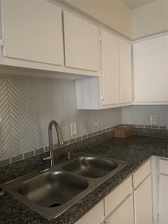 5625 Antoine Dr Unit 1405, Houston, TX 77091 - kitchen with white cabinetry and tasteful backsplash