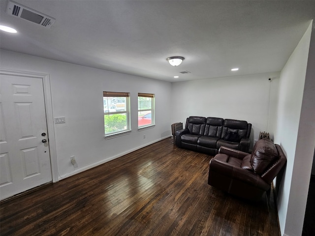907 Whitaker Ave, Pasadena, TX 77506 - living area featuring dark wood finished floors and recessed lighting