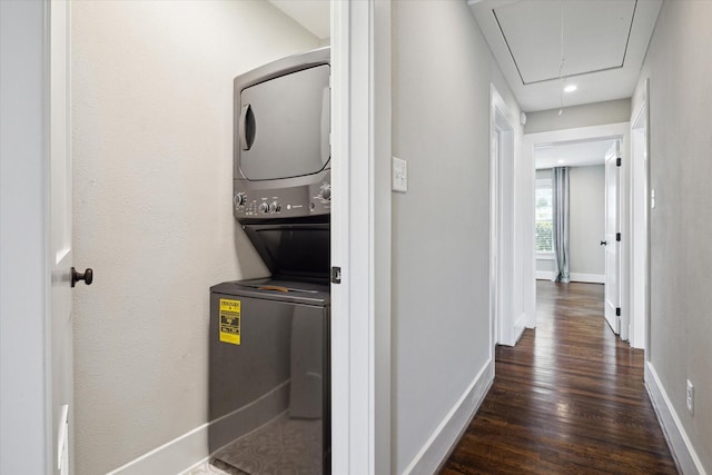 5001 Farmer St, Houston, TX 77020 - washroom with attic access, stacked washer / drying machine, dark wood finished floors, and recessed lighting