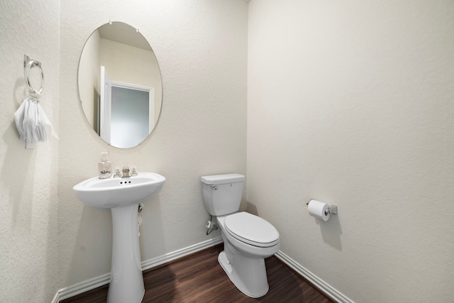 6406 Shadowbrook Hollow Trl, Katy, TX 77493 - bathroom with wood finished floors and toilet
