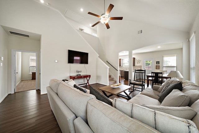 6406 Shadowbrook Hollow Trl, Katy, TX 77493 - living room featuring a ceiling fan, dark wood-style flooring, high vaulted ceiling, stairway, and recessed lighting