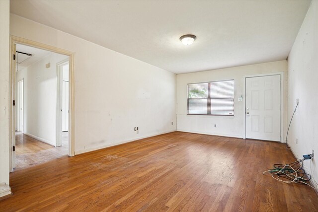 8510 Montridge Dr, Houston, TX 77055 - spare room featuring wood finished floors and baseboards