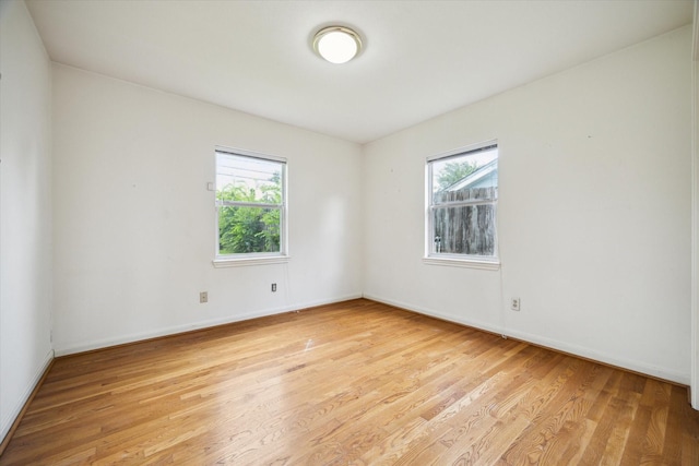 8510 Montridge Dr, Houston, TX 77055 - empty room featuring plenty of natural light and light wood finished floors