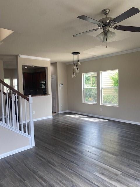 16707 Libson Falls Dr, Houston, TX 77095 - unfurnished room featuring ceiling fan, dark wood-style flooring, stairway, and crown molding