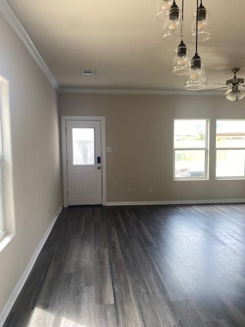 16707 Libson Falls Dr, Houston, TX 77095 - entryway featuring dark wood-type flooring, ceiling fan, and ornamental molding