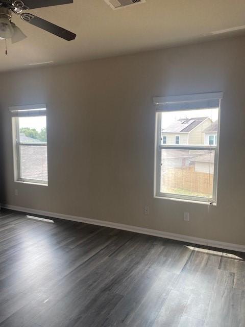 16707 Libson Falls Dr, Houston, TX 77095 - empty room featuring dark wood-type flooring and ceiling fan