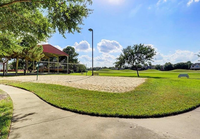16707 Libson Falls Dr, Houston, TX 77095 - view of property's community featuring volleyball court, a lawn, and view of golf course