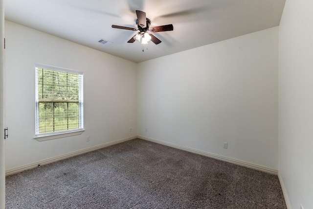 104 Drexal Dr, Huntsville, TX 77340 - empty room featuring carpet flooring and a ceiling fan